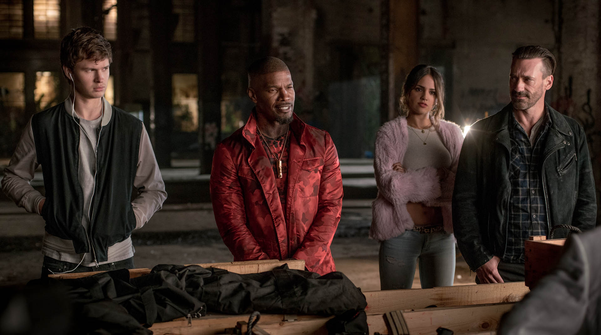 Baby (Ansel Elgort), Bats (Jamie Foxx), Darling (Eiza Gonzalez) and Buddy (Jon Hamm) just before a deal goes south
